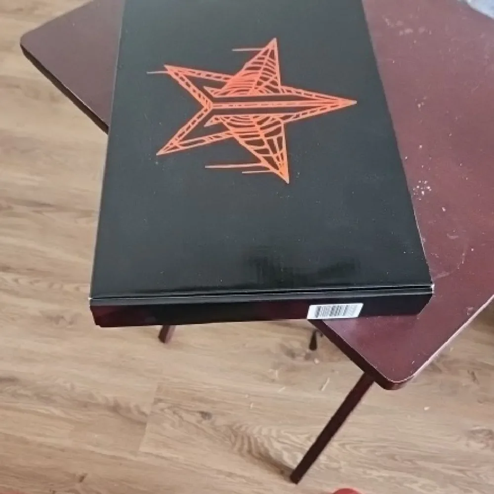 Jeffree Star Black Mirror with Orange Star Design